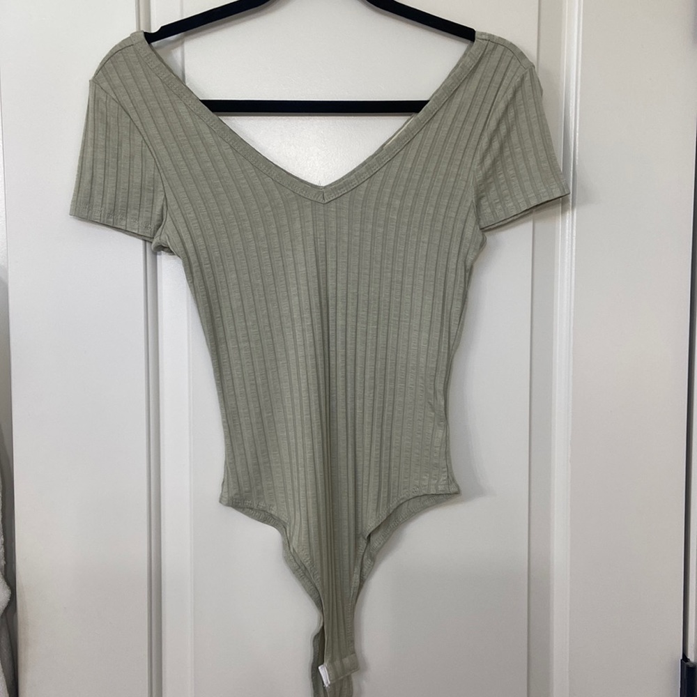 NEVER WORN. Altar’d state, green bodysuit